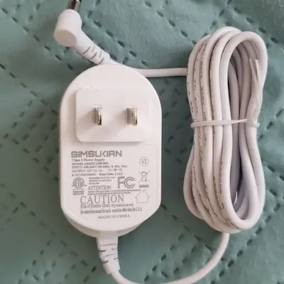 Simsukian SK02T-1200100U 12V 1A AC/DC Adapter