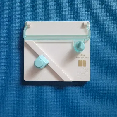 We R Memory Keepers Maker's Tag Punch Board, Off-White
