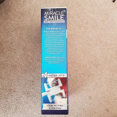 Miracle Smile Cordless Water Flosser with H-Shaped Head and 4 Jets photo 2