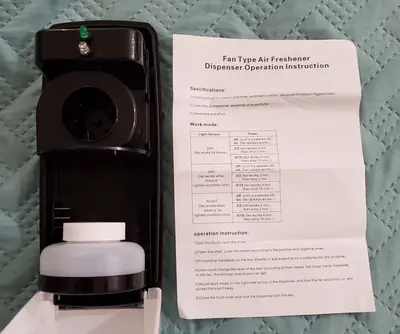 Automatic Fan-Type Light-Sensor Air Freshener Dispenser photo 3