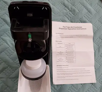 Automatic Fan-Type Light-Sensor Air Freshener Dispenser photo 4